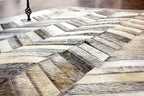 Chevron Pattern Faux Cowhide Area Rug | Non-Slip Leather Carpet for Living Room, Bedroom, and Office | Modern Designer Rug for Home Décor(8x10 ft_Grey)