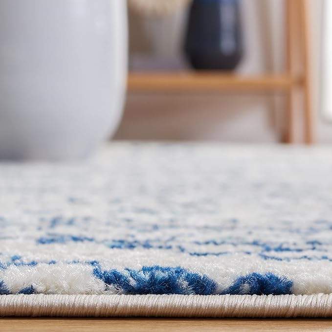 SAFAVIEH Tulum Collection Area Rug - 5'3" x 7'6", Ivory & Navy, Moroccan Boho Tribal Design, Non-Shedding & Easy to Clean, Ideal for Living Room, Bedroom, Dining Space (TUL272D)