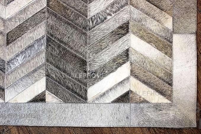 Chevron Pattern Faux Cowhide Area Rug | Non-Slip Leather Carpet for Living Room, Bedroom, and Office | Modern Designer Rug for Home Décor(10x14 ft_Grey)