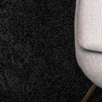 Unique Loom Solid Shag Collection Area Rug (4' 1" Round, Jet Black)
