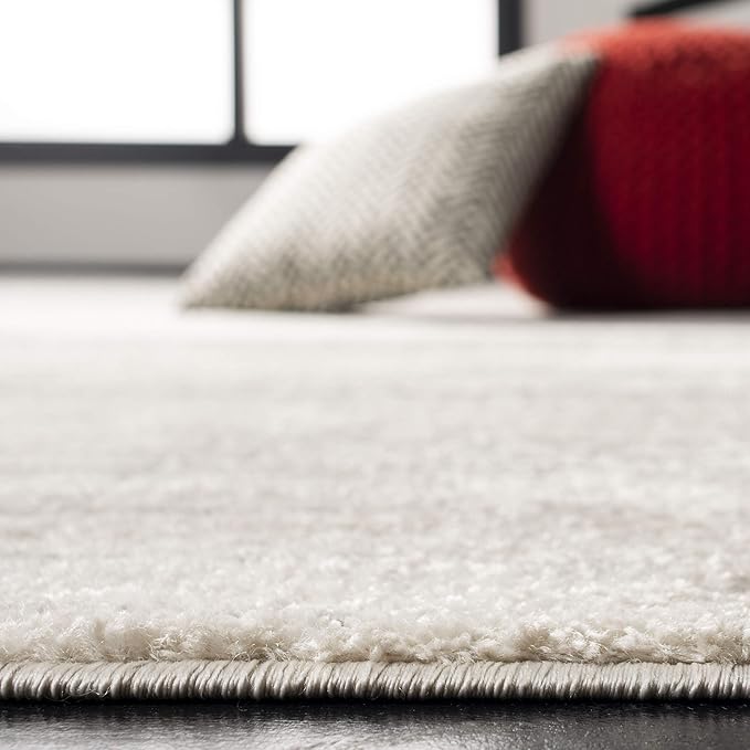 SAFAVIEH Area Rug 6x9 - Adirondack Collection - Ivory & Silver, Modern Ombre Design, Non Shedding & Easy to Clean, Ideal for Living Room, Bedroom, Office, Dining Space (ADR113B)