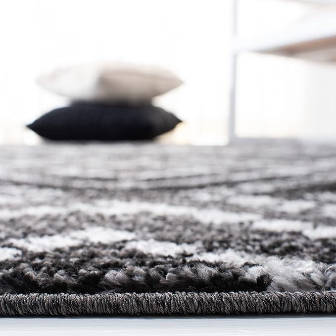 SAFAVIEH Adirondack Collection Accent Rug - 4' x 6', Black & Ivory, Modern Distressed Design, Non-Shedding & Easy Care, Ideal for High Traffic Areas in Entryway, Living Room, Bedroom (ADR131A)