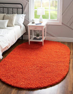 Unique Loom Solid Shag Collection Area Rug (5' 1" x 8' Oval, Tiger Orange)