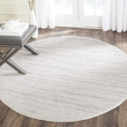 SAFAVIEH Adirondack Collection Area Rug - 6' Round, Ivory & Silver, Modern Ombre Design, Non Shedding & Easy to Clean, Ideal for Living Room, Bedroom, Office, Dining Space (ADR113B)