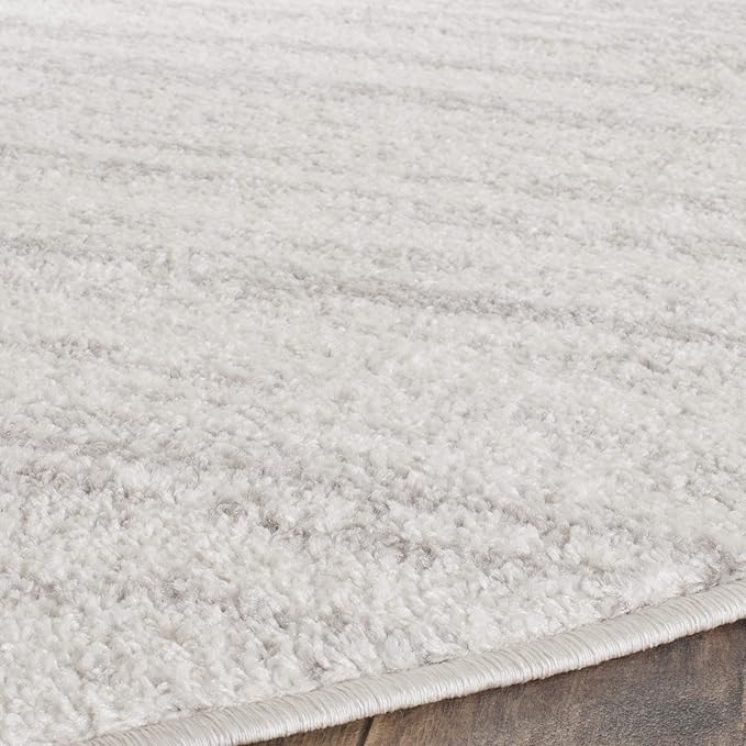SAFAVIEH Adirondack Collection Area Rug - 10' Round, Ivory & Silver, Modern Ombre Design, Non Shedding & Easy to Clean, Ideal for Living Room, Bedroom, Office, Dining Space (ADR113B)