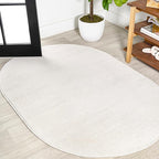JONATHAN Y Haze Solid Low-Pile Cream 6x9 Oval Indoor Area Rug, Coastal,Bohemian,Minimalist,Classic, Easy-Cleaning for Living Room,Bedroom,Kitchen,Pet Friendly,Non-Shedding (SEU100T-6OV)