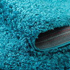Unique Loom Solid Shag Collection Area Rug (5' 1" x 8' Oval, Turquoise)