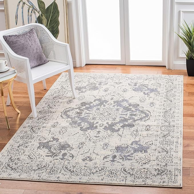 SAFAVIEH Monaco Collection Area Rug - 6'7" x 9'2", Ivory & Grey, Boho Chic Medallion Distressed Design, Non-Shedding & Easy Care, Ideal for High Traffic Areas in Living Room, Bedroom (MNC243B)