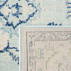SAFAVIEH Monaco Collection Area Rug - 9' x 12', Light Blue & Ivory, Boho Chic Medallion Distressed Design, Non-Shedding & Easy Care, Ideal for High Traffic Areas in Living Room, Bedroom (MNC243K)