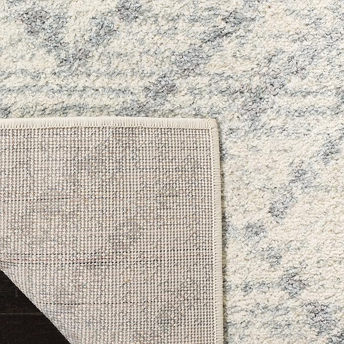 SAFAVIEH Adirondack Collection Area Rug - 6' x 9', Ivory & Light Blue, Modern Diamond Distressed Design, Non-Shedding & Easy Care, Ideal for High Traffic Areas in Living Room, Bedroom (ADR131T)
