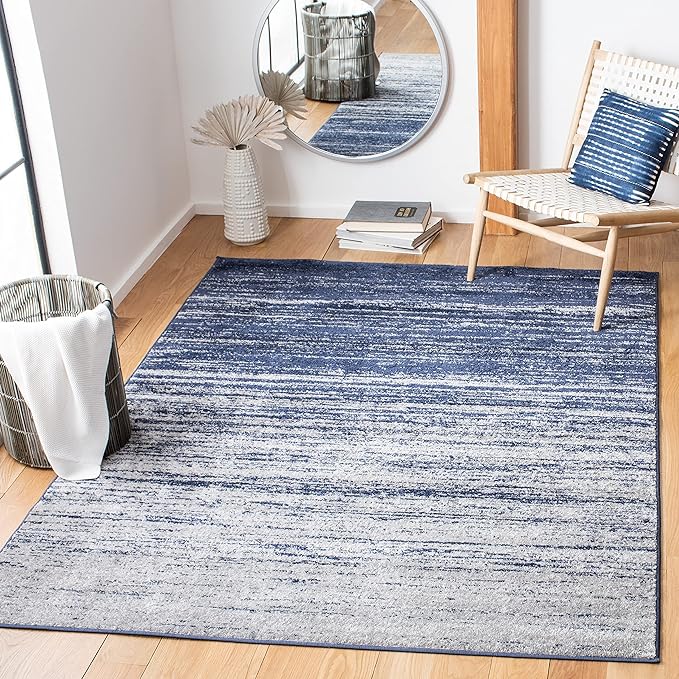 SAFAVIEH Adirondack Collection Area Rug - 5'5" x 7'7", Navy & Grey, Modern Ombre Design, Non Shedding & Easy to Clean, Ideal for Living Room, Bedroom, Office, Dining Space (ADR113E)