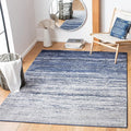 SAFAVIEH Adirondack Collection Area Rug - 5'5" x 7'7", Navy & Grey, Modern Ombre Design, Non Shedding & Easy to Clean, Ideal for Living Room, Bedroom, Office, Dining Space (ADR113E)