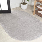 JONATHAN Y Haze Solid Low-Pile Light Gray 6x9 Oval Indoor Area Rug, Coastal,Bohemian,Minimalist,Classic, Easy-Cleaning for Living Room,Bedroom,Kitchen,Pet Friendly,Non-Shedding (SEU100K-6OV)