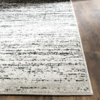 SAFAVIEH Area Rug 9x12 - Adirondack Collection - Large - Silver & Black, Modern Ombre Design, Non Shedding & Easy to Clean, Ideal for Living Room, Bedroom, Office, Dining Space (ADR113A)