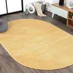 JONATHAN Y Haze Solid Low-Pile Mustard 6x9 Oval Indoor Area Rug, Coastal,Bohemian,Minimalist,Classic, Easy-Cleaning for Living Room,Bedroom,Kitchen,Pet Friendly,Non-Shedding (SEU100B-6OV)